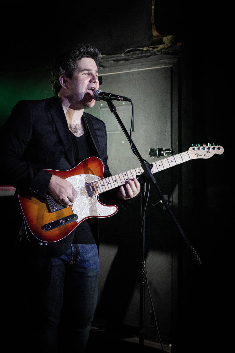 The recording artist and singer/songwriter Elison with a Fender Telecaster on stage