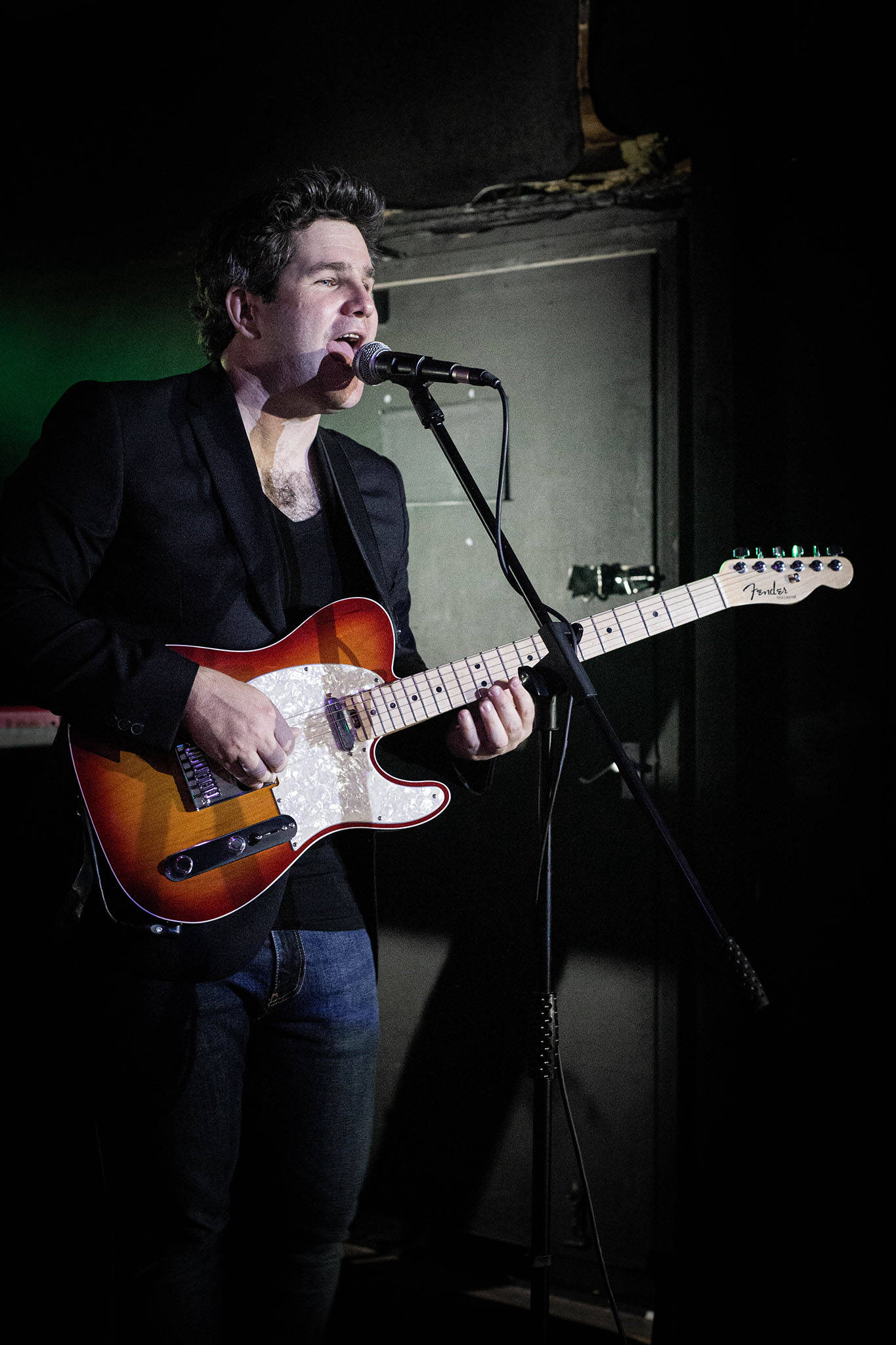 The recording artist and singer/songwriter Elison with a Fender Telecaster on stage
