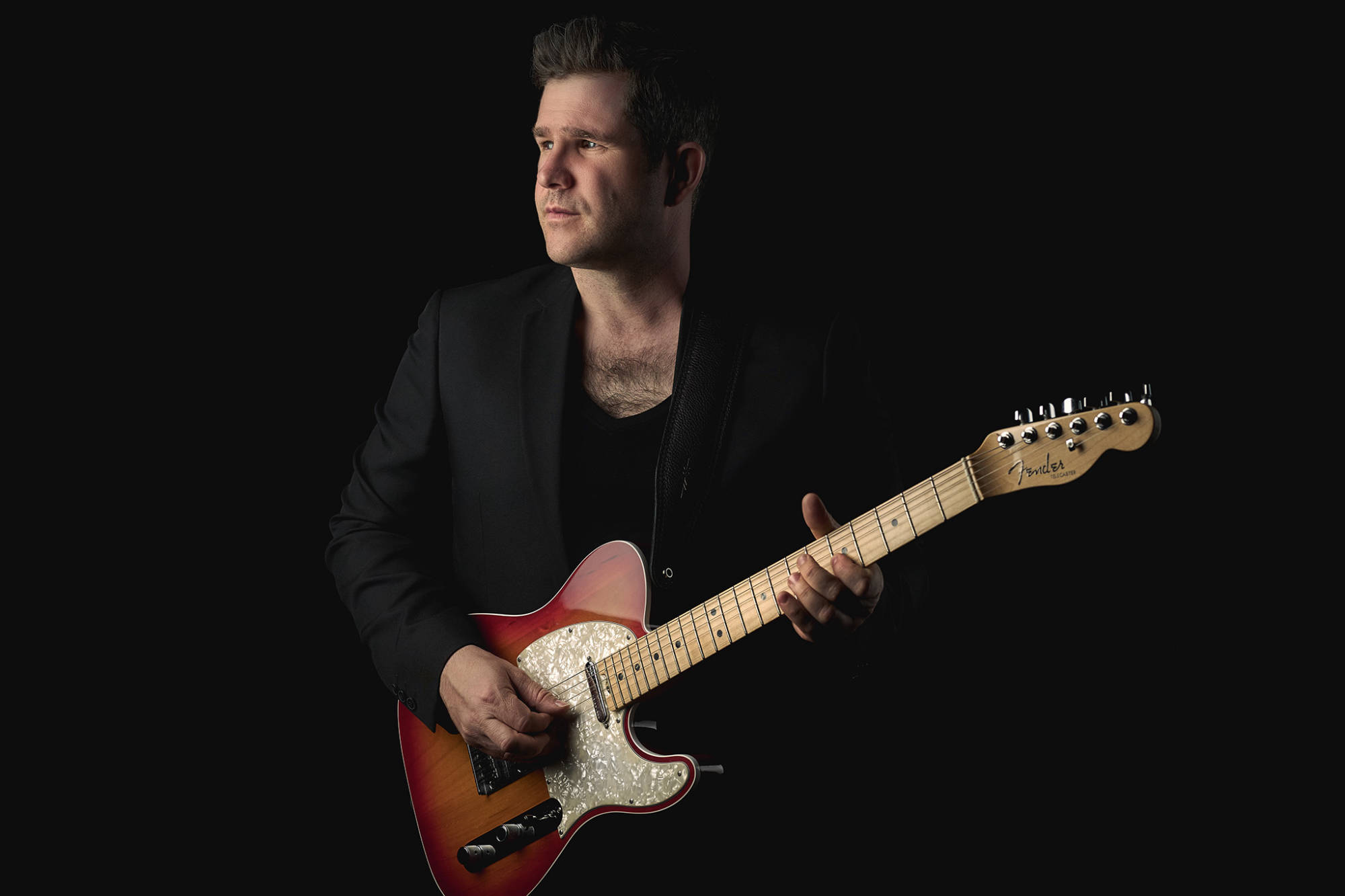 The recording artist and singer/songwriter Elison with a Fender Telecaster