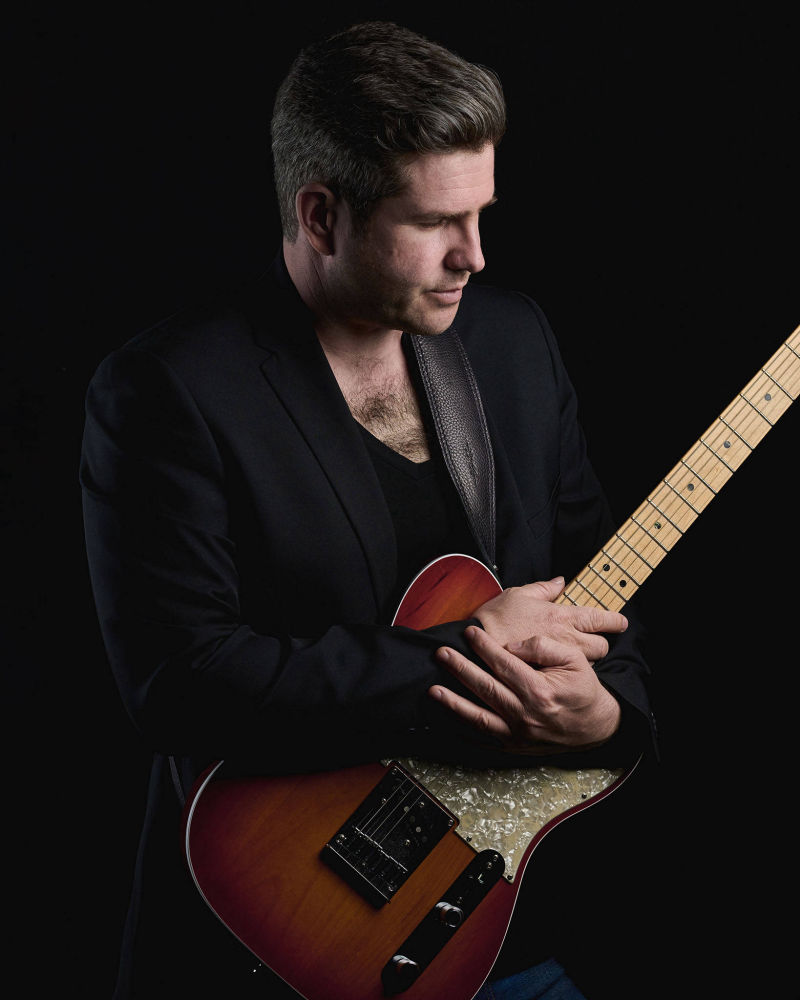 The recording artist and singer/songwriter Elison with a Fender Telecaster