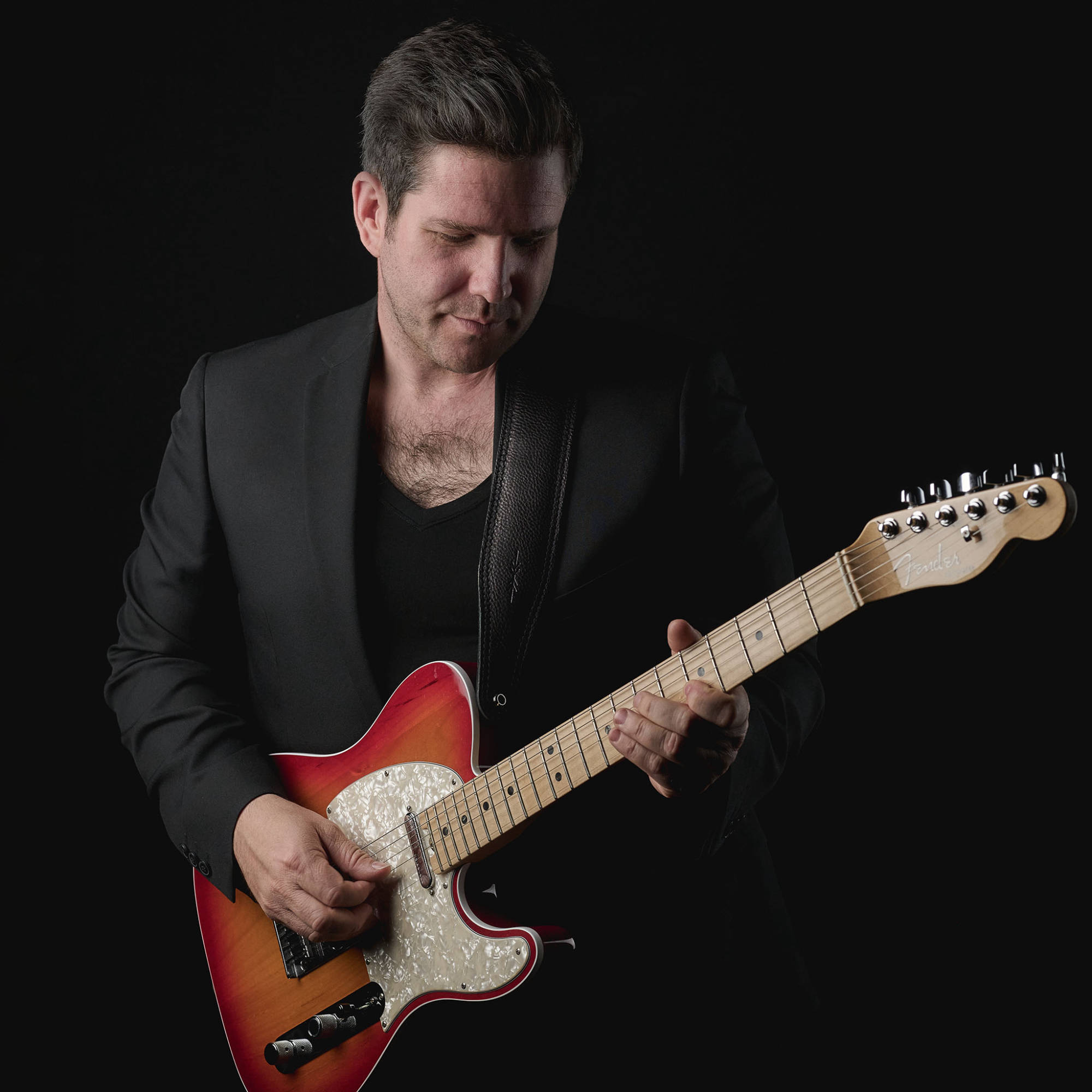 The recording artist and singer/songwriter Elison with a Fender Telecaster